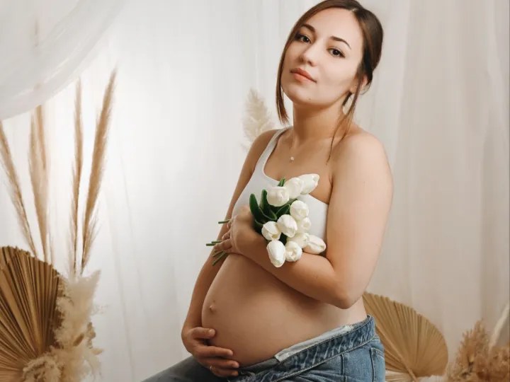 Future maman lors d'une séance grossesse